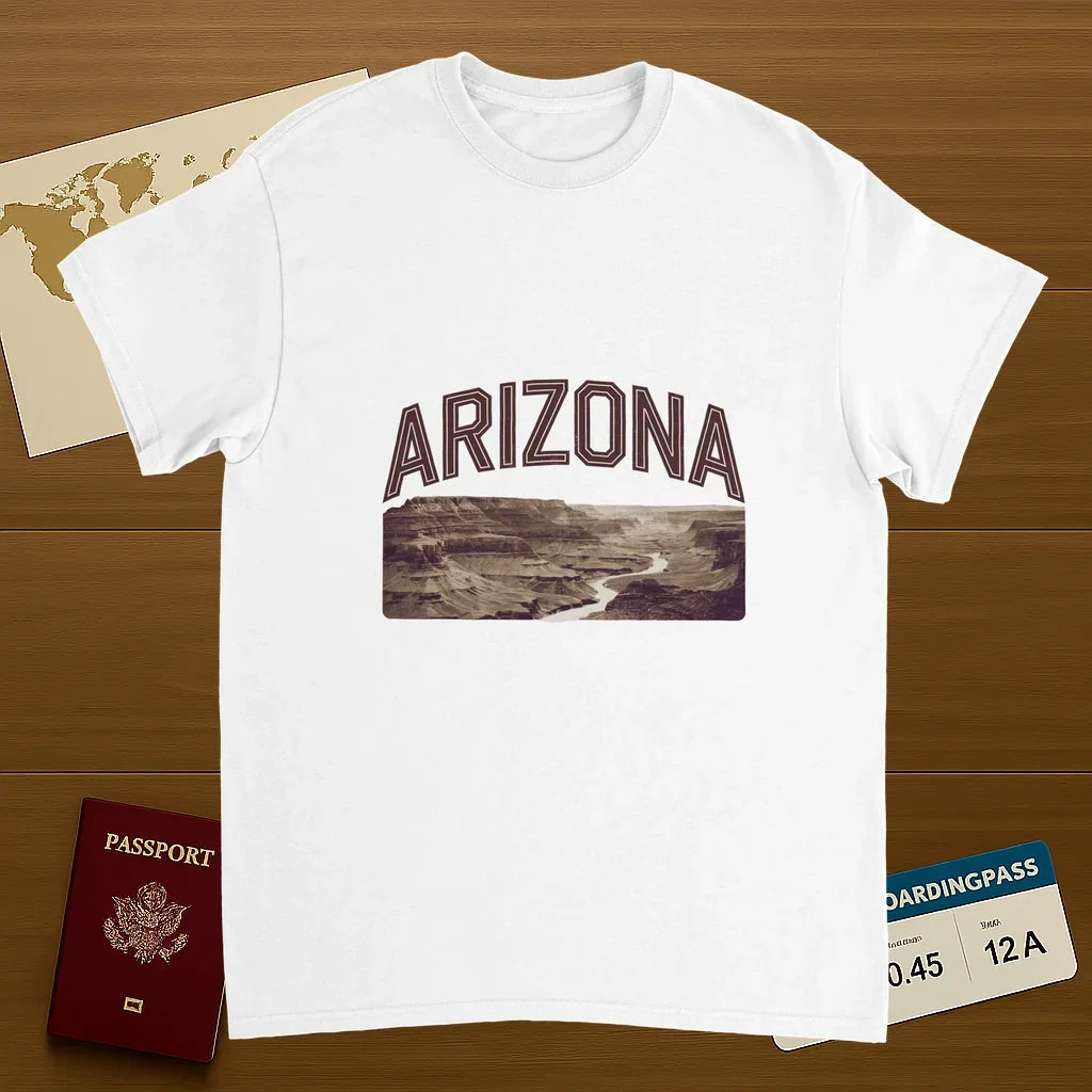 white Arizona USA Unisex Travel T-Shirt on wooden background with world map, passport, and boarding pass