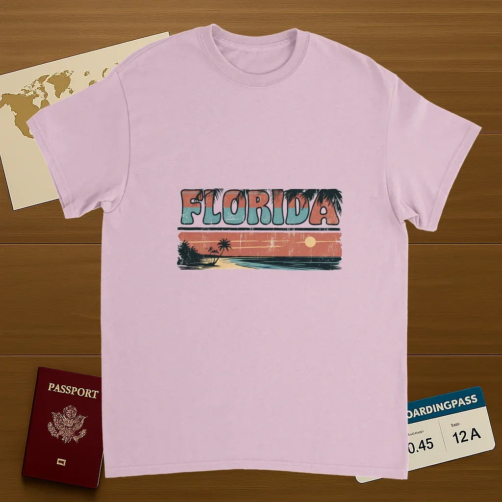 light pink Florida USA Unisex Travel T-Shirt on wooden background with world map, passport, and boarding pass