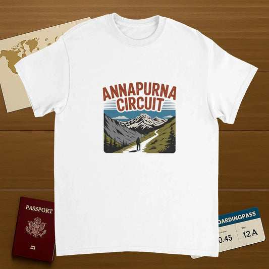 white Annapurna Circuit Nepal Unisex Travel T-Shirt on wooden background with world map, passport, and boarding pass