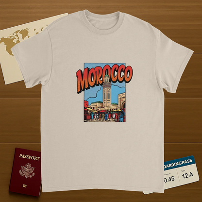 Morocco Unisex Travel T-Shirt on wooden background with world map, passport, and boarding pass
