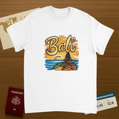 white Bali Unisex Travel T-Shirt on wooden background with world map, passport, and boarding pass