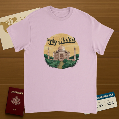 light pink Taj Mahal Agra India Unisex Travel T-Shirt on wooden background with world map, passport, and boarding pass