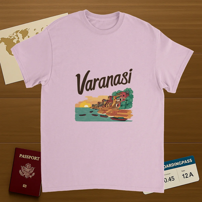 light pink Varanasi India Unisex Travel T-Shirt on wooden background with world map, passport, and boarding pass