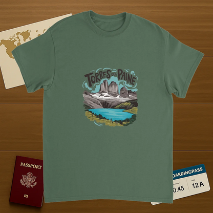 military green Torres del Paine Chile Unisex Travel T-Shirt on wooden background with world map, passport, and boarding pass