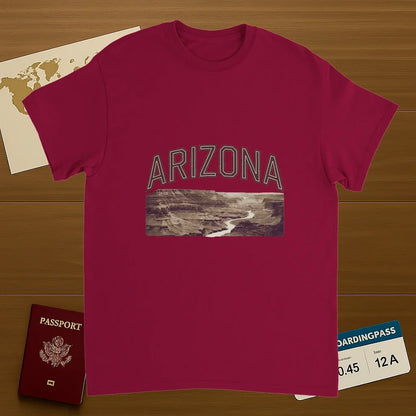 cardinal red Arizona USA Unisex Travel T-Shirt on wooden background with world map, passport, and boarding pass