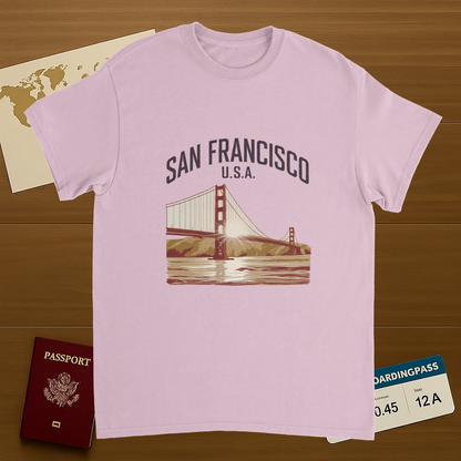 light pink San Francisco USA Unisex Travel T-Shirt on wooden background with world map, passport, and boarding pass