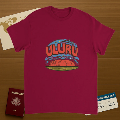 cardinal red Uluru Australia Unisex Travel T-Shirt on wooden background with world map, passport, and boarding pass