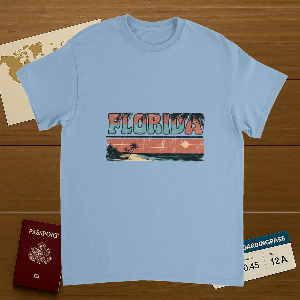 light blue Florida USA Unisex Travel T-Shirt on wooden background with world map, passport, and boarding pass