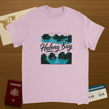 light pink Halong Bay Vietnam Unisex Travel T-Shirt on wooden background with world map, passport, and boarding pass