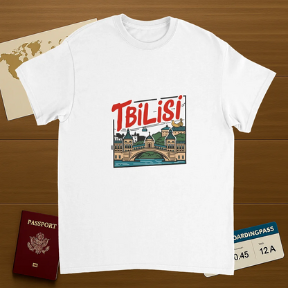 white Tbilisi Georgia Unisex Travel T-Shirt on wooden background with world map, passport, and boarding pass