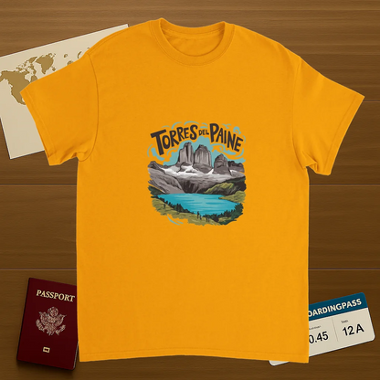 gold Torres del Paine Chile Unisex Travel T-Shirt on wooden background with world map, passport, and boarding pass