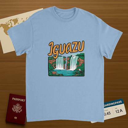 light blue Iguazu Falls Unisex Travel T-Shirt on wooden background with world map, passport, and boarding pass