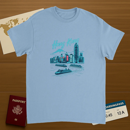 light blue Hong Kong Unisex Travel T-Shirt on wooden background with world map, passport, and boarding pass