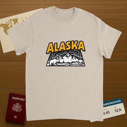 Alaska USA Unisex Travel T-Shirt on wooden background with world map, passport, and boarding pass