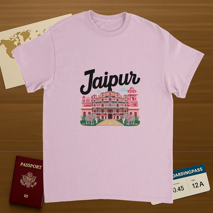 light pink Jaipur India Unisex Travel T-Shirt on wooden background with world map, passport, and boarding pass