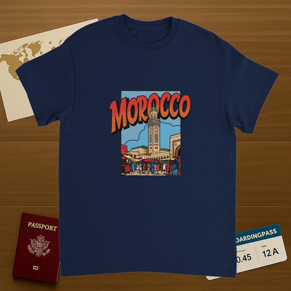 navy Morocco Unisex Travel T-Shirt on wooden background with world map, passport, and boarding pass