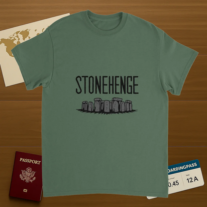 military green Stonehenge England Unisex Travel T-Shirt on wooden background with world map, passport, and boarding pass