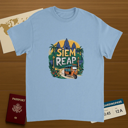 light blue Siem Reap Cambodia Unisex Travel T-Shirt on wooden background with world map, passport, and boarding pass