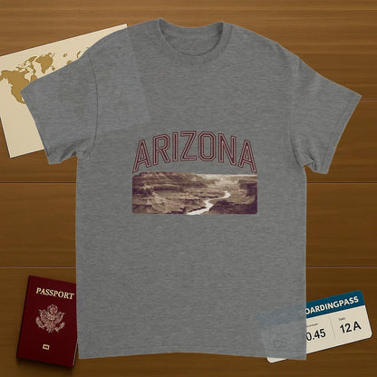 sport grey Arizona USA Unisex Travel T-Shirt on wooden background with world map, passport, and boarding pass