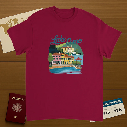 cardinal red Lake Como Italy Unisex Travel T-Shirt on wooden background with world map, passport, and boarding pass