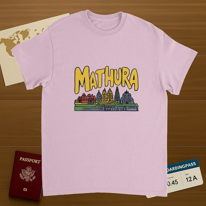 light pink Mathura India Unisex Travel T-Shirt on wooden background with world map, passport, and boarding pass