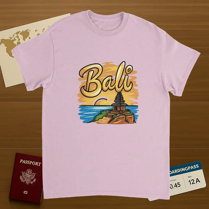 light pink Bali Unisex Travel T-Shirt on wooden background with world map, passport, and boarding pass