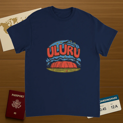 navy Uluru Australia Unisex Travel T-Shirt on wooden background with world map, passport, and boarding pass