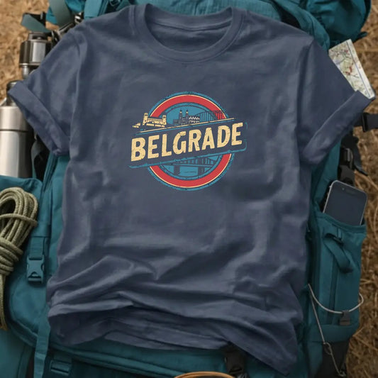 Navy blue t-shirt with 'BELGRADE' graphic design on a backpack and travel gear background