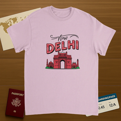 light pink New Delhi India Unisex Travel T-Shirt on wooden background with world map, passport, and boarding pass