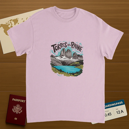 light pink Torres del Paine Chile Unisex Travel T-Shirt on wooden background with world map, passport, and boarding pass