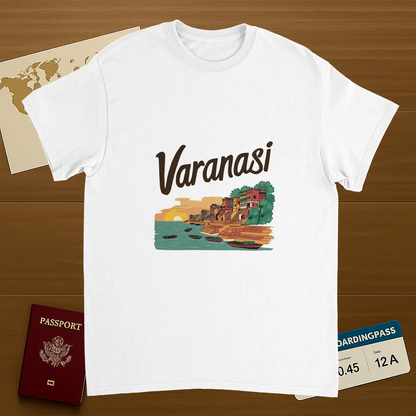 white Varanasi India Unisex Travel T-Shirt on wooden background with world map, passport, and boarding pass