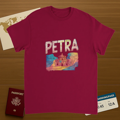 cardinal red Petra Jordan Unisex Travel T-Shirt on wooden background with world map, passport, and boarding pass