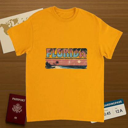 gold Florida USA Unisex Travel T-Shirt on wooden background with world map, passport, and boarding pass