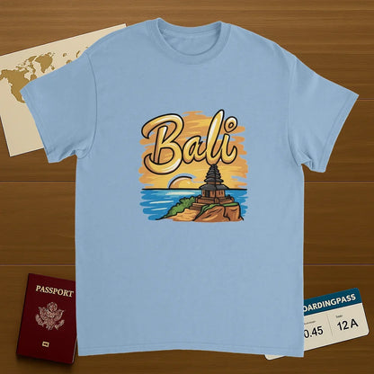 light blue Bali Unisex Travel T-Shirt on wooden background with world map, passport, and boarding pass