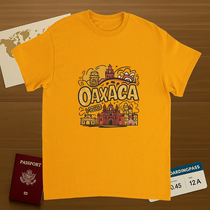 gold Oaxaca Mexico Unisex Travel T-Shirt on wooden background with world map, passport, and boarding pass
