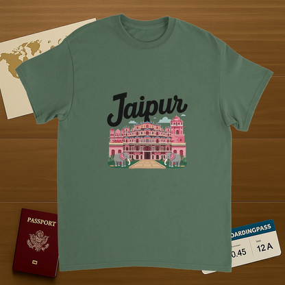 military green Jaipur India Unisex Travel T-Shirt on wooden background with world map, passport, and boarding pass