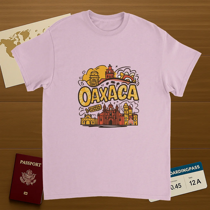 light pink Oaxaca Mexico Unisex Travel T-Shirt on wooden background with world map, passport, and boarding pass