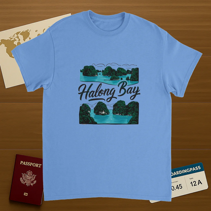 carolina blue Halong Bay Vietnam Unisex Travel T-Shirt on wooden background with world map, passport, and boarding pass