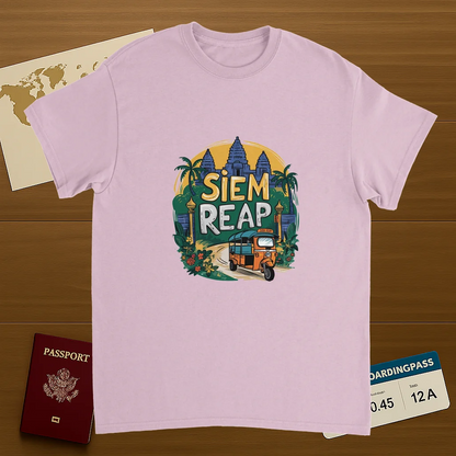 light pink Siem Reap Cambodia Unisex Travel T-Shirt on wooden background with world map, passport, and boarding pass