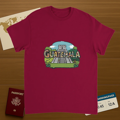 cardinal red Guatemala Unisex Travel T-Shirt on wooden background with world map, passport, and boarding pass
