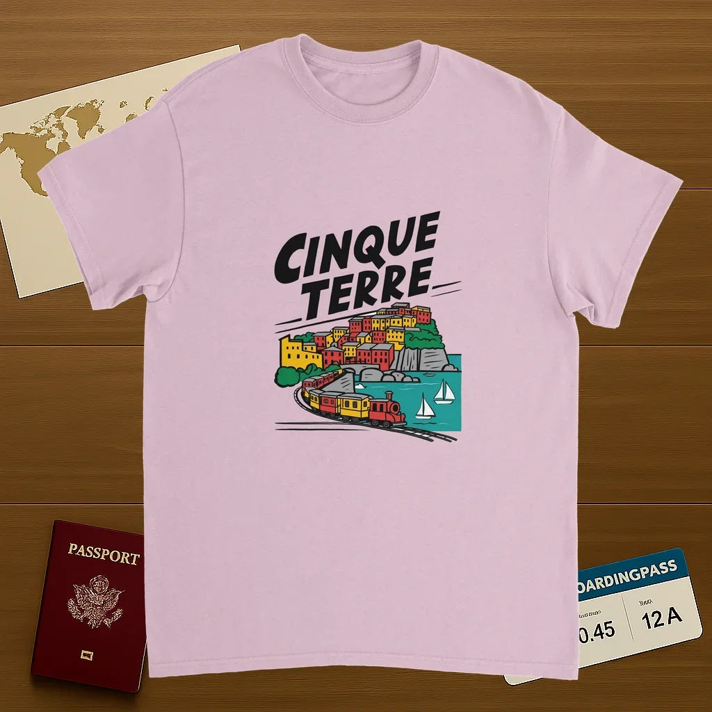 light pink Cinque Terre Italy Unisex Travel T-Shirt on wooden background with world map, passport, and boarding pass