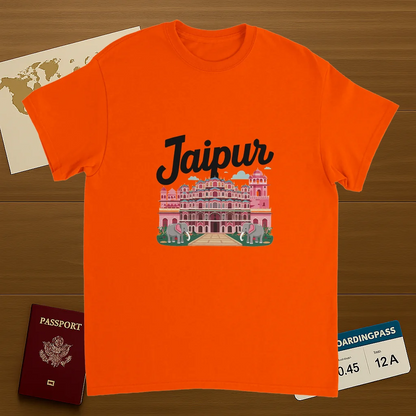 orange Jaipur India Unisex Travel T-Shirt on wooden background with world map, passport, and boarding pass
